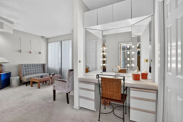 a garden with trees in front of it