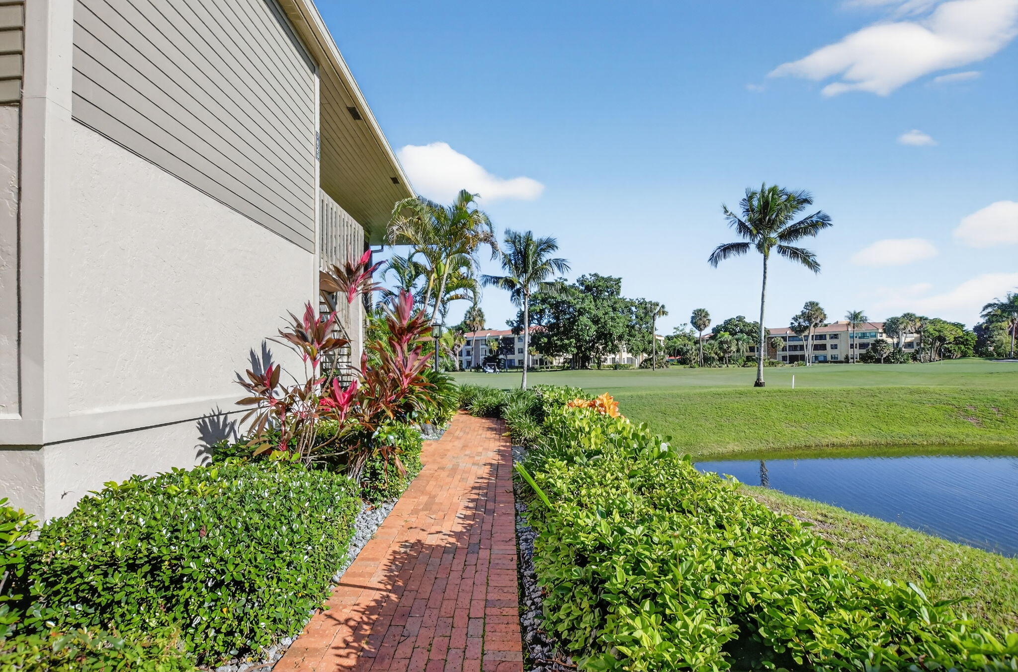 7623 Cinebar Drive, Unit 30U Boca Raton, FL 33433 - Photo 4 of 86 a view of a garden with a flower in a garden