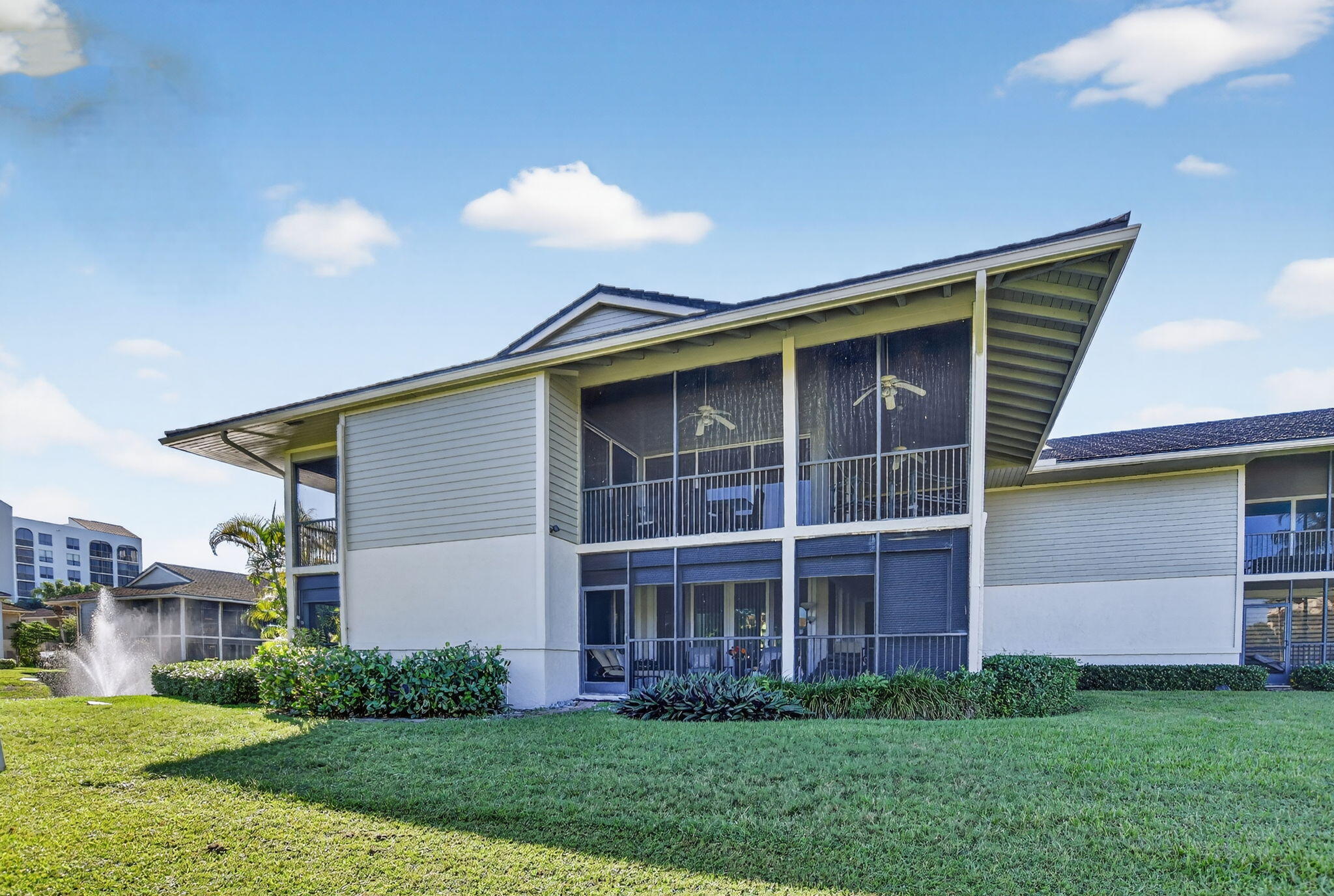 7623 Cinebar Drive, Unit 30U Boca Raton, FL 33433 - Photo 56 of 86 a front view of a house with a yard