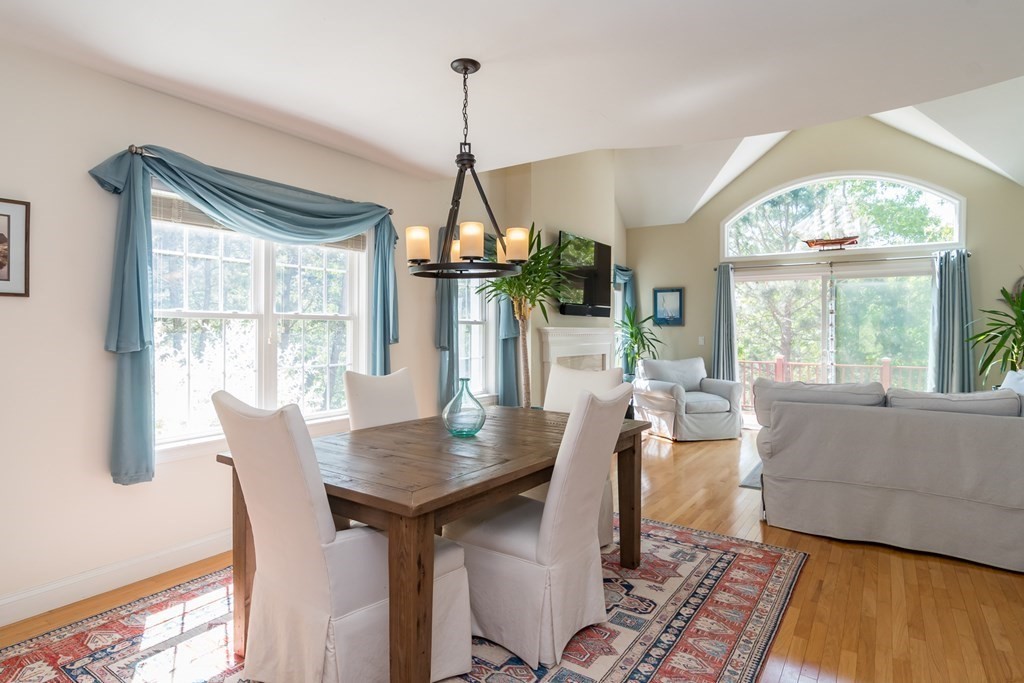 28 Prestwick Road, Unit 188 Bourne, MA 02532 - Photo 11 of 41 a dining room with furniture window wooden floor