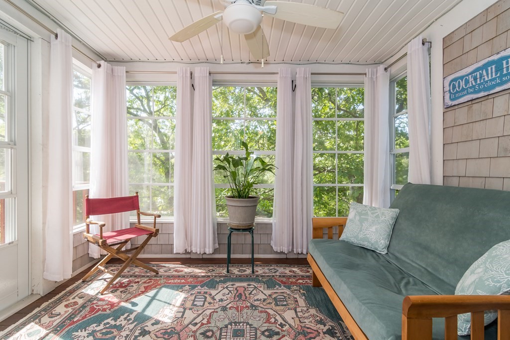 28 Prestwick Road, Unit 188 Bourne, MA 02532 - Photo 20 of 41 a living room with furniture and a large window