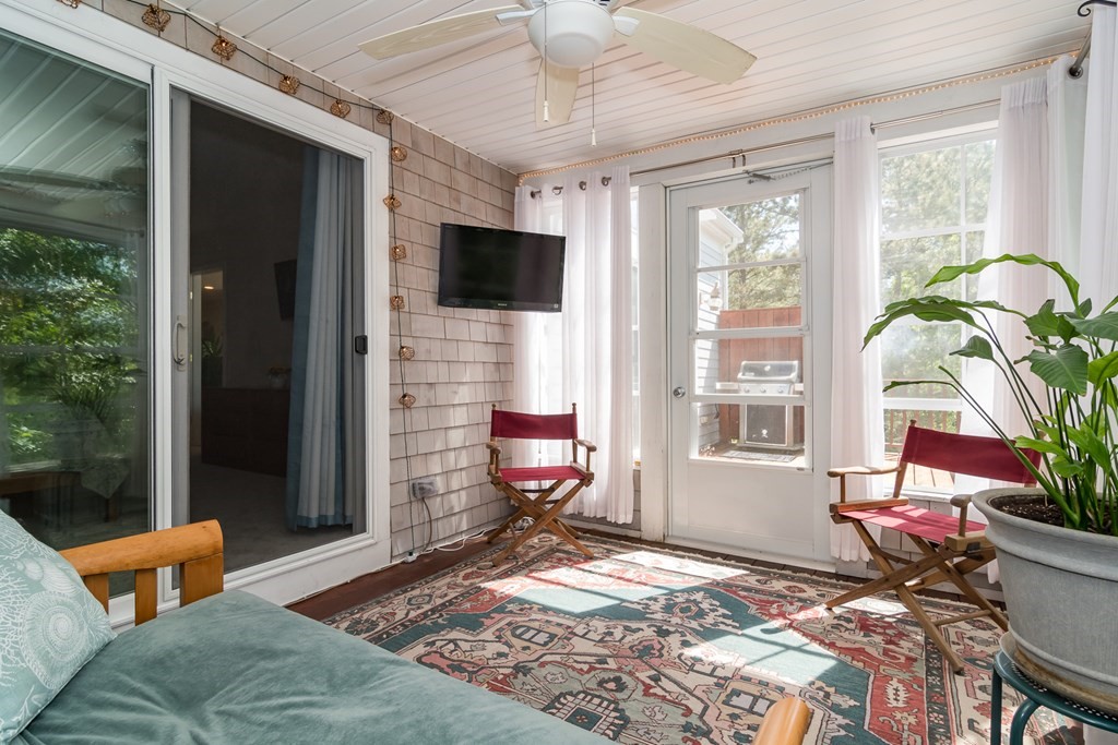28 Prestwick Road, Unit 188 Bourne, MA 02532 - Photo 21 of 41 a bedroom with furniture and a flat screen tv