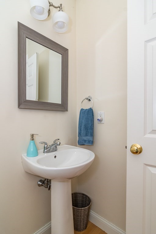 28 Prestwick Road, Unit 188 Bourne, MA 02532 - Photo 26 of 41 a bathroom with a sink and a mirror
