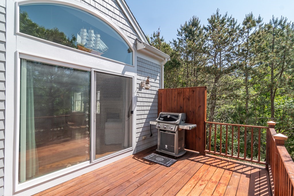 28 Prestwick Road, Unit 188 Bourne, MA 02532 - Photo 29 of 41 a view of a balcony with wooden floor and outdoor space
