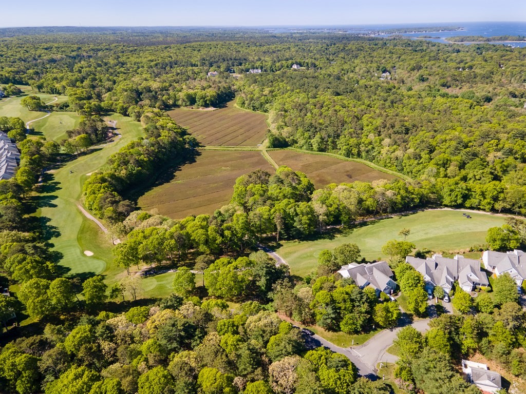 28 Prestwick Road, Unit 188 Bourne, MA 02532 - Photo 34 of 41 a view of a lake with a mountain in the background