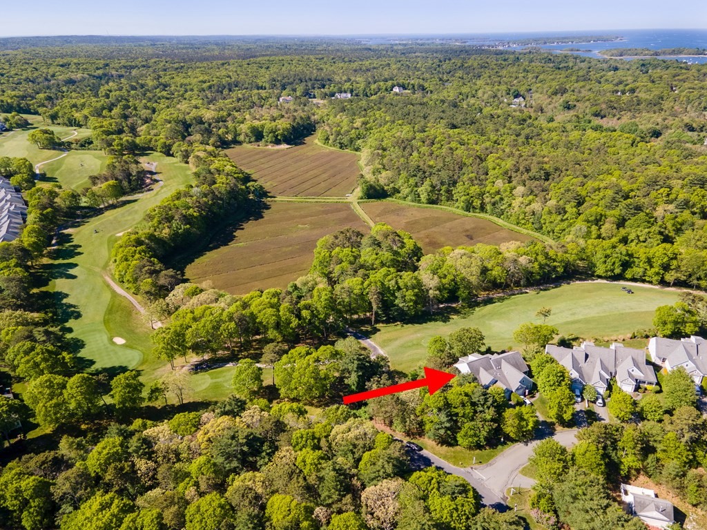 28 Prestwick Road, Unit 188 Bourne, MA 02532 - Photo 35 of 41 a view of a lake with a mountain in the background