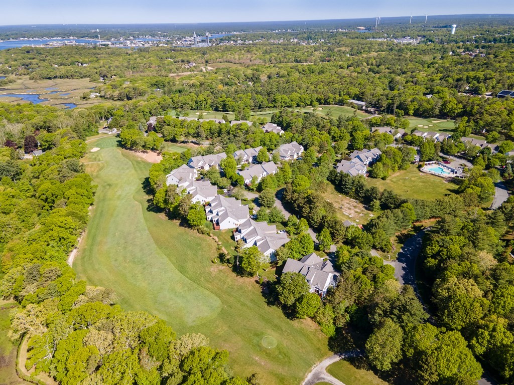 28 Prestwick Road, Unit 188 Bourne, MA 02532 - Photo 36 of 41 a view of a lot of trees and houses
