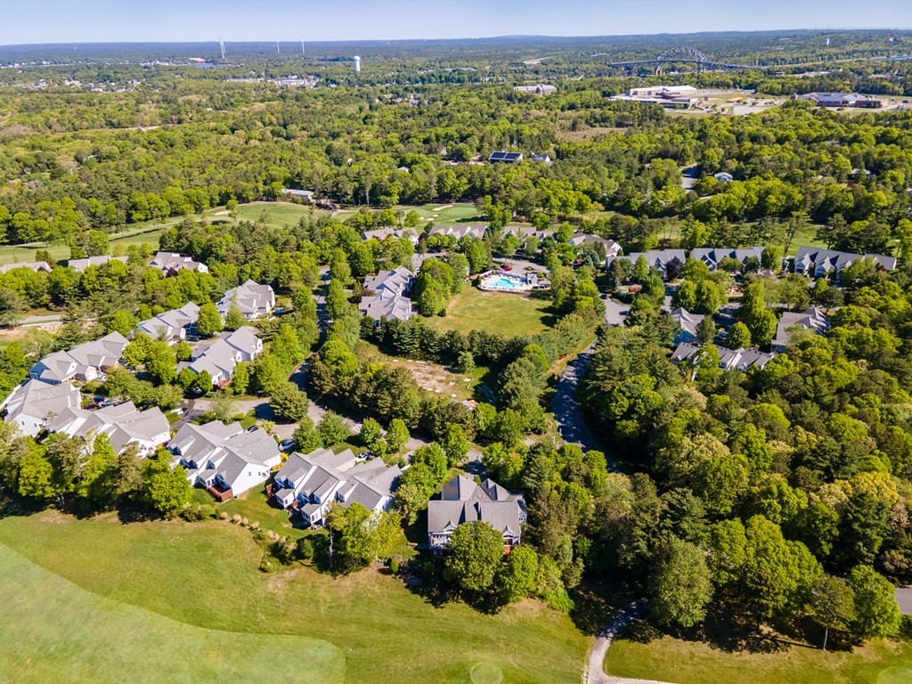 28 Prestwick Road, Unit 188 Bourne, MA 02532 - Photo 38 of 41 a view of a lot of trees and houses