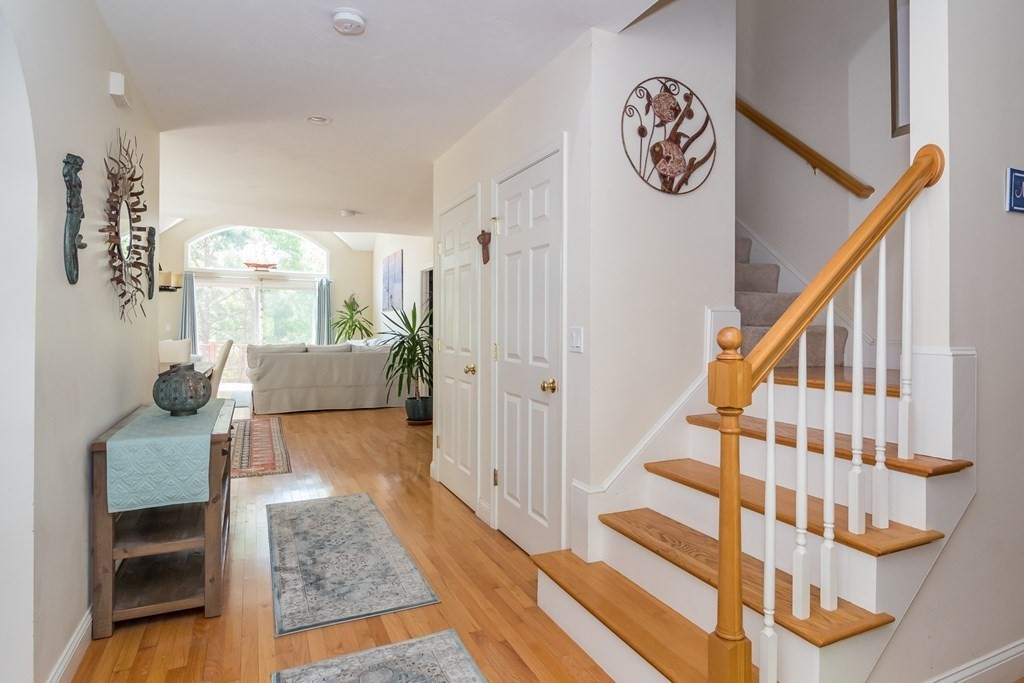28 Prestwick Road, Unit 188 Bourne, MA 02532 - Photo 4 of 41 a view of entryway and hall with wooden floor