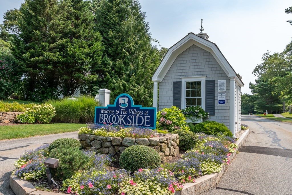 28 Prestwick Road, Unit 188 Bourne, MA 02532 - Photo 41 of 41 a front view of a house with a yard