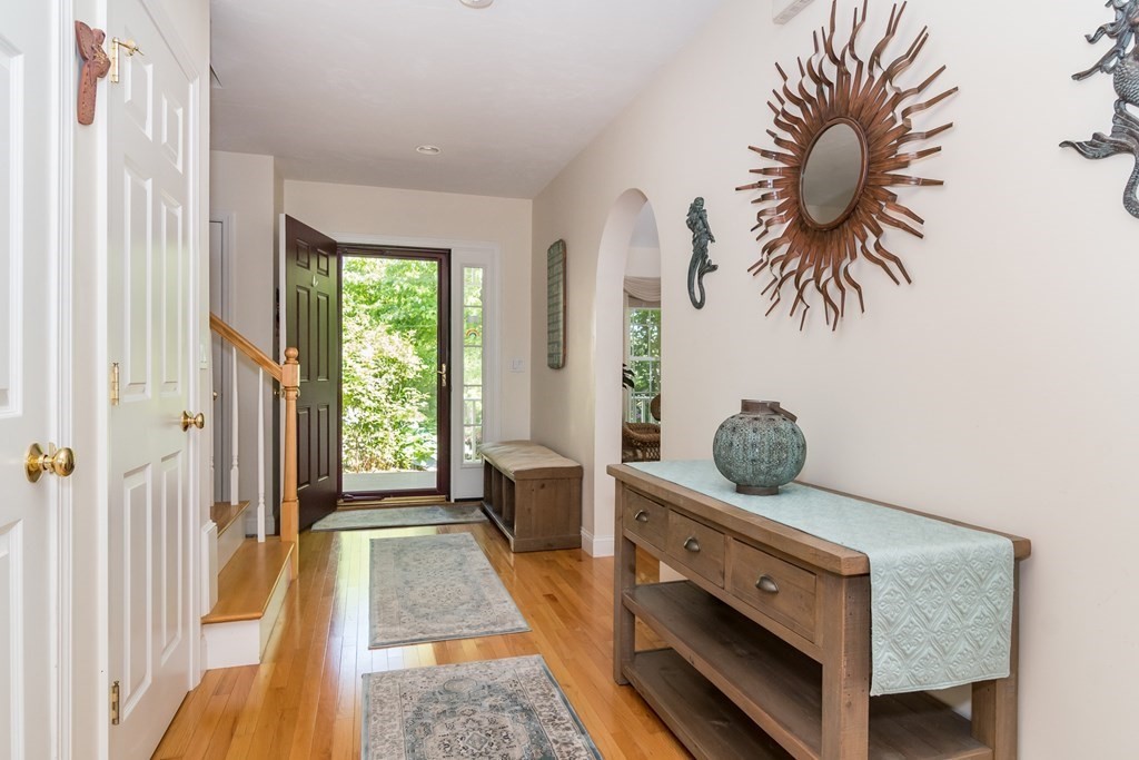 28 Prestwick Road, Unit 188 Bourne, MA 02532 - Photo 5 of 41 a room with furniture and a potted plant