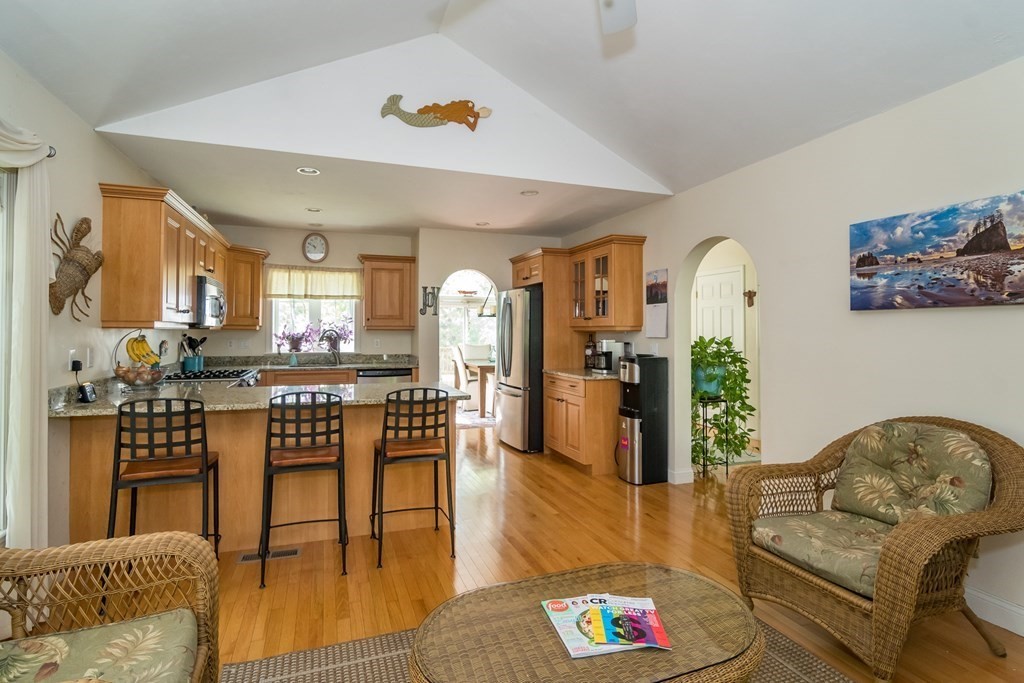 28 Prestwick Road, Unit 188 Bourne, MA 02532 - Photo 7 of 41 a living room with furniture and wooden floor