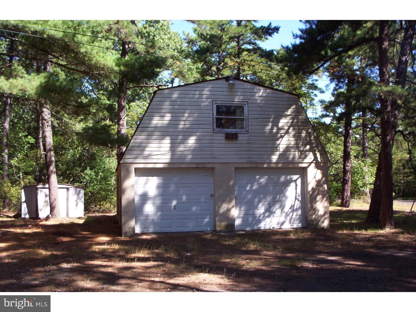 227 Ridge Road Browns Mills, NJ 08015 - Photo 15 of 17 a view of house with yard