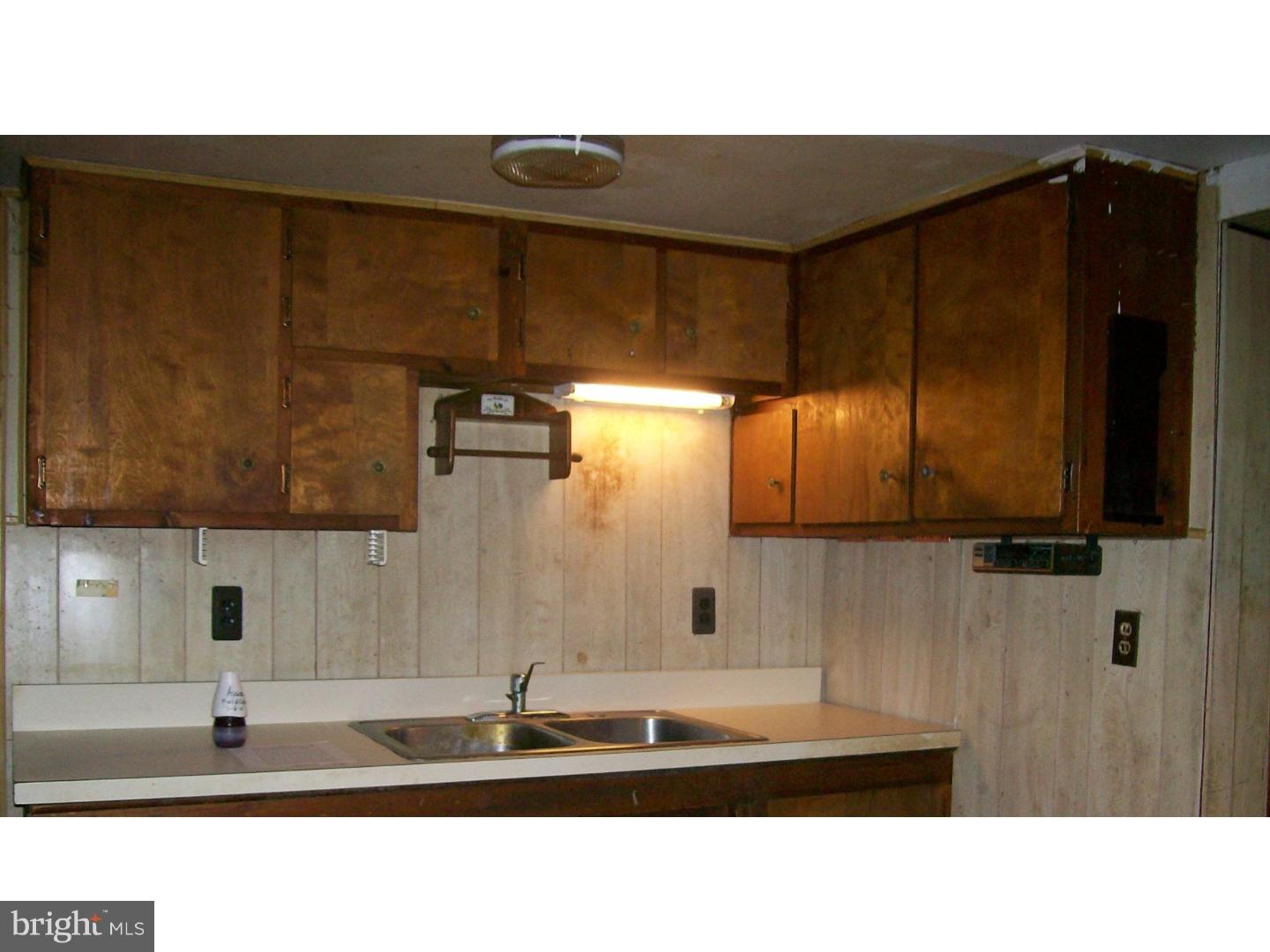 227 Ridge Road Browns Mills, NJ 08015 - Photo 5 of 17 a bathroom with a sink and a mirror