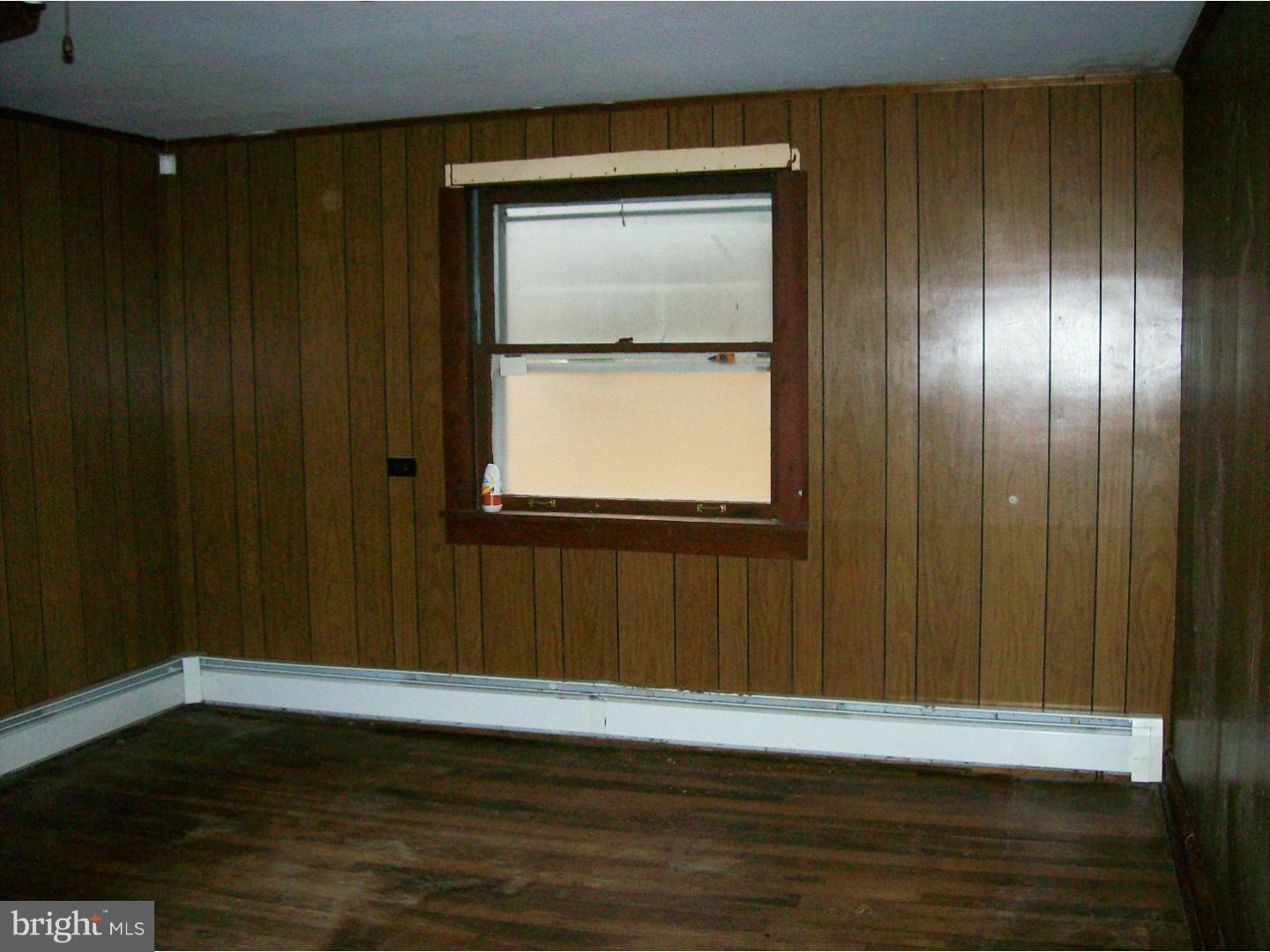 227 Ridge Road Browns Mills, NJ 08015 - Photo 10 of 17 a view of a livingroom with wooden floor and a window