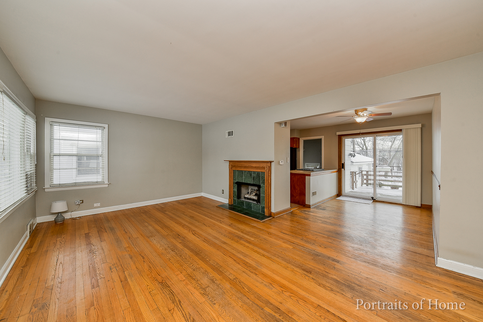 437 Austin Street Downers Grove, IL 60515 - Photo 2 of 16 wooden floor in an empty room with a fireplace
