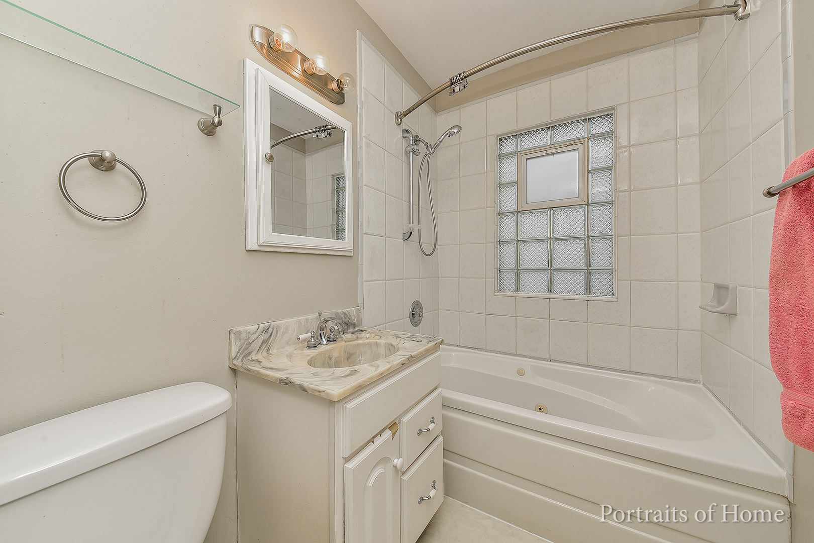 437 Austin Street Downers Grove, IL 60515 - Photo 6 of 16 a bathroom with a granite countertop sink a toilet and shower