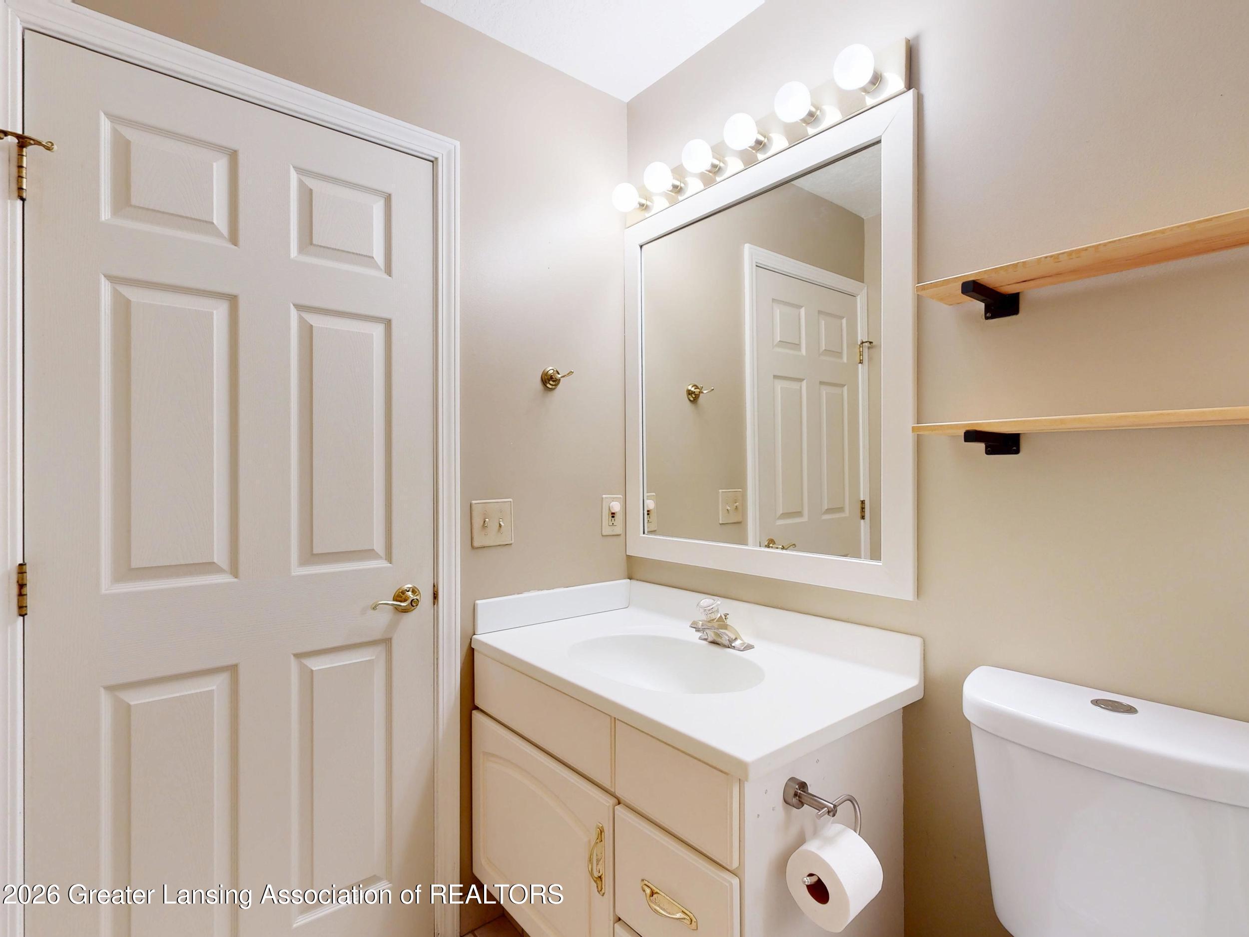 6464 Lounsbury Road Williamston, MI 48895 - Photo 25 of 92 1st Floor Hall Bath