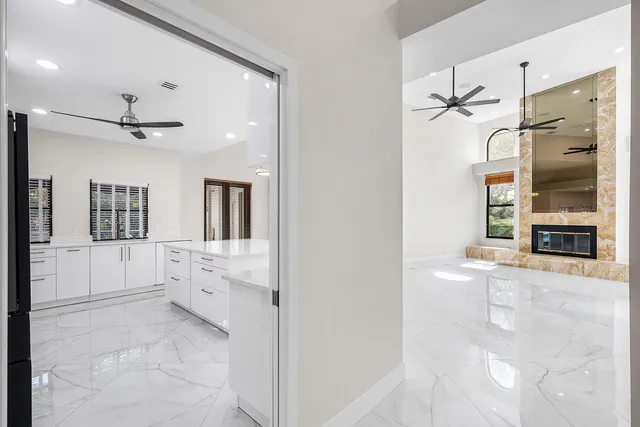 a bathroom with a tub sink and shower