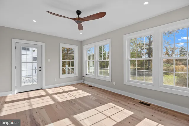 a living room with a couch and a rug