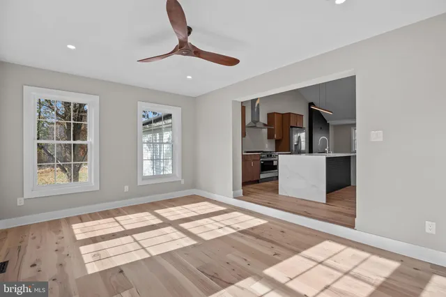 a view of entryway with wooden floor