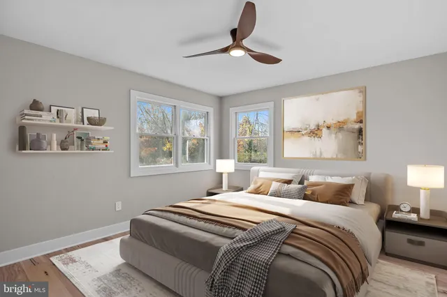 a bathroom with a sink a mirror and shower