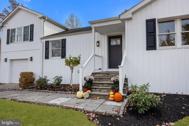 a front view of a house with patio