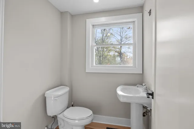 a aerial view of a house with outdoor space lake view