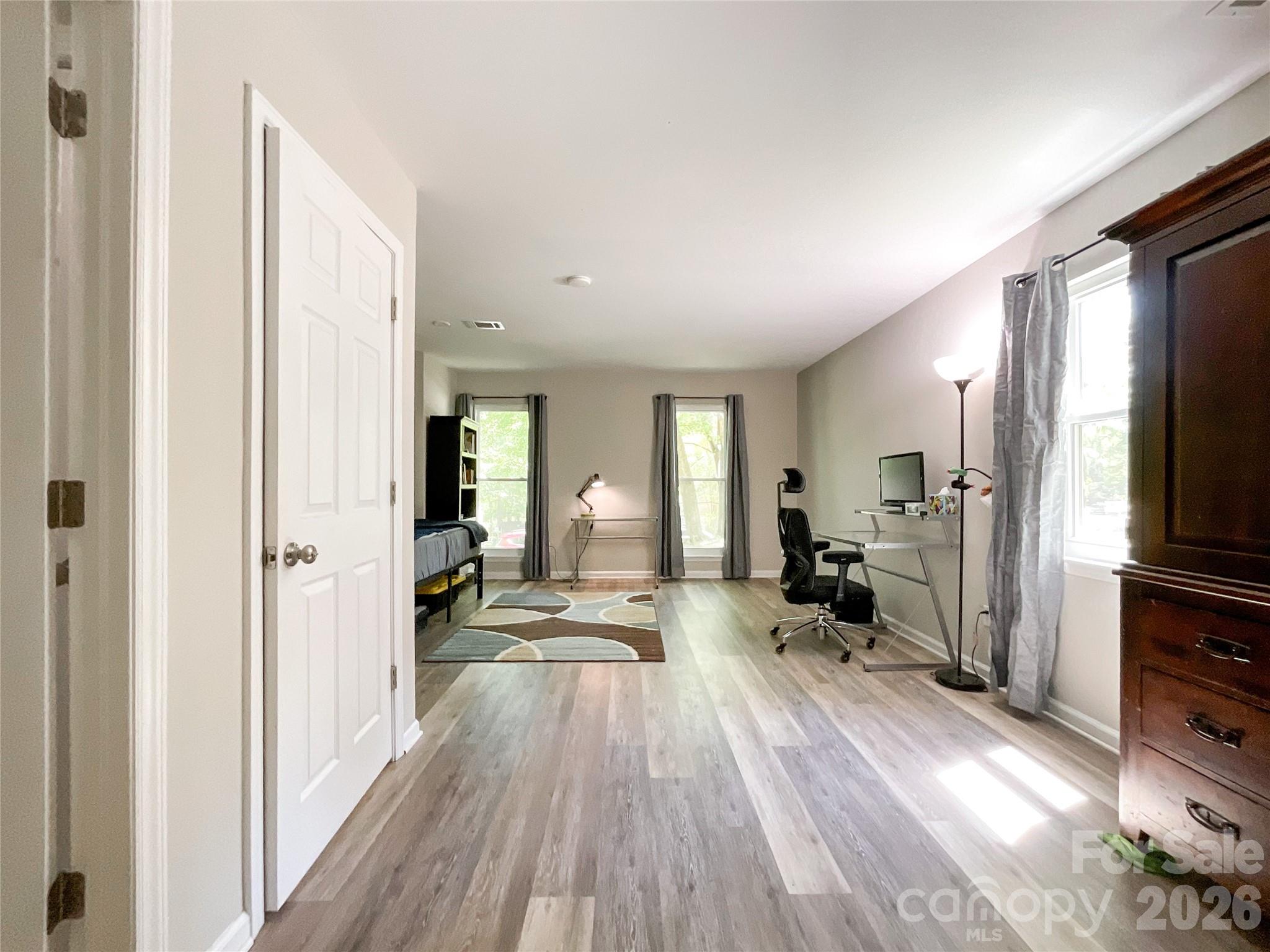 2113 Killarney Place Charlotte, NC 28262 - Photo 13 of 19 a view of a living room and dining room