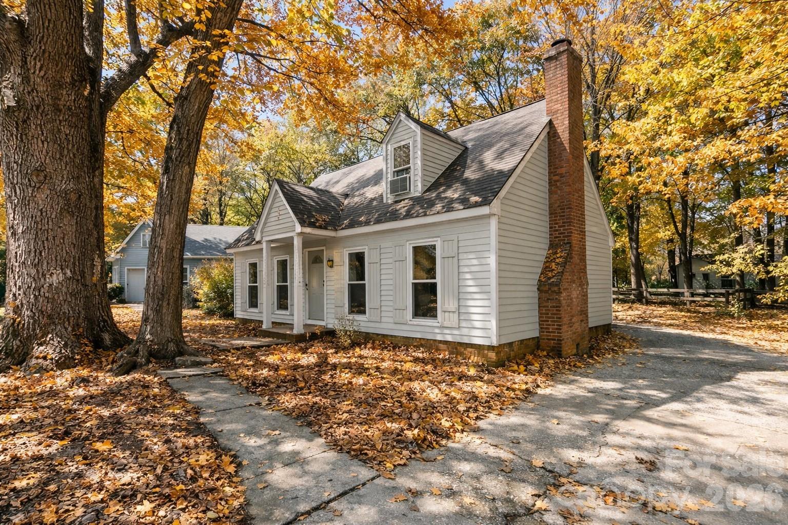 2113 Killarney Place Charlotte, NC 28262 - Photo 2 of 19 a front view of a house with a yard