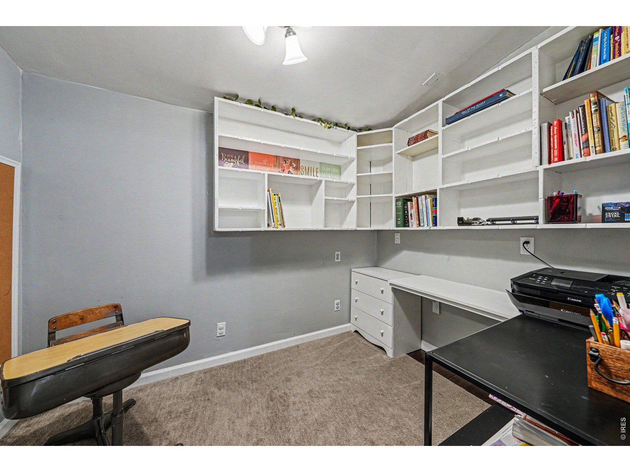 1430 30th Street Road Greeley, CO 80631 - Photo 13 of 22 a room with storage and utility