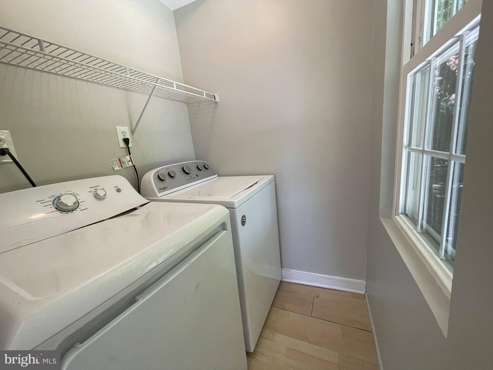 5817 Kingswood Road Bethesda, MD 20814 - Photo 29 of 40 a utility room with dryer and washer