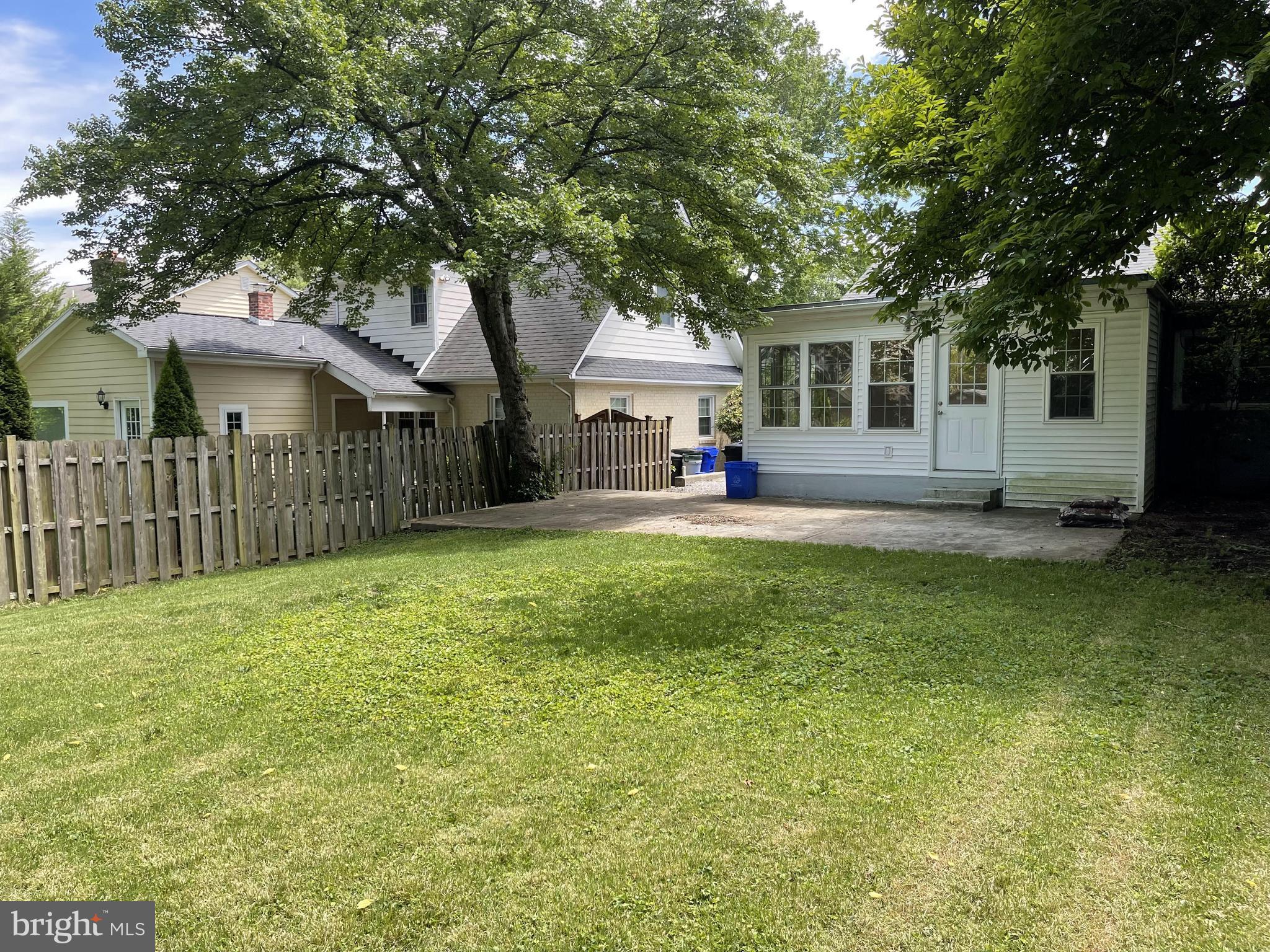 5817 Kingswood Road Bethesda, MD 20814 - Photo 38 of 40 a house view with a sitting space and garden