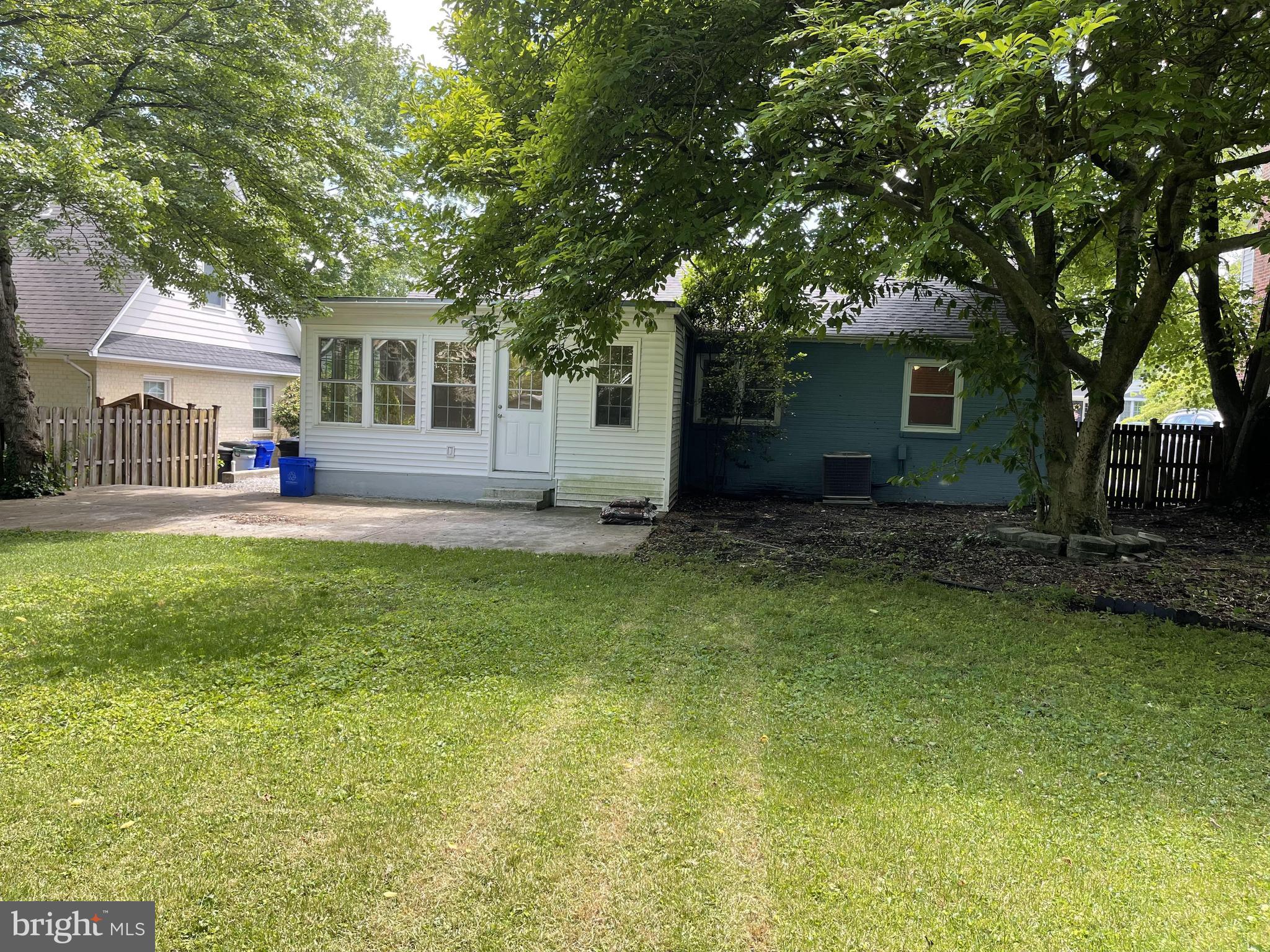 5817 Kingswood Road Bethesda, MD 20814 - Photo 40 of 40 a house view with swimming pool in front of it
