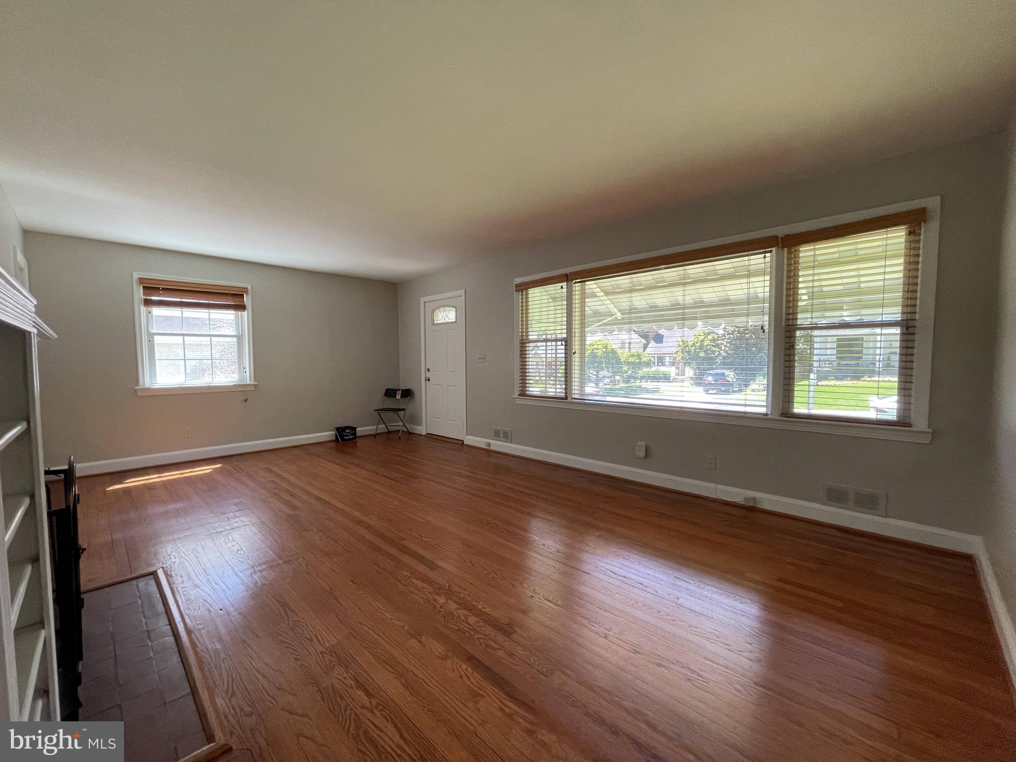 5817 Kingswood Road Bethesda, MD 20814 - Photo 6 of 40 a view of empty room with wooden floor and fan