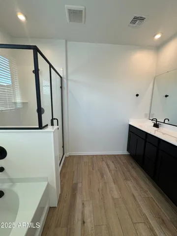 a bathroom with a sink a toilet and bathtub