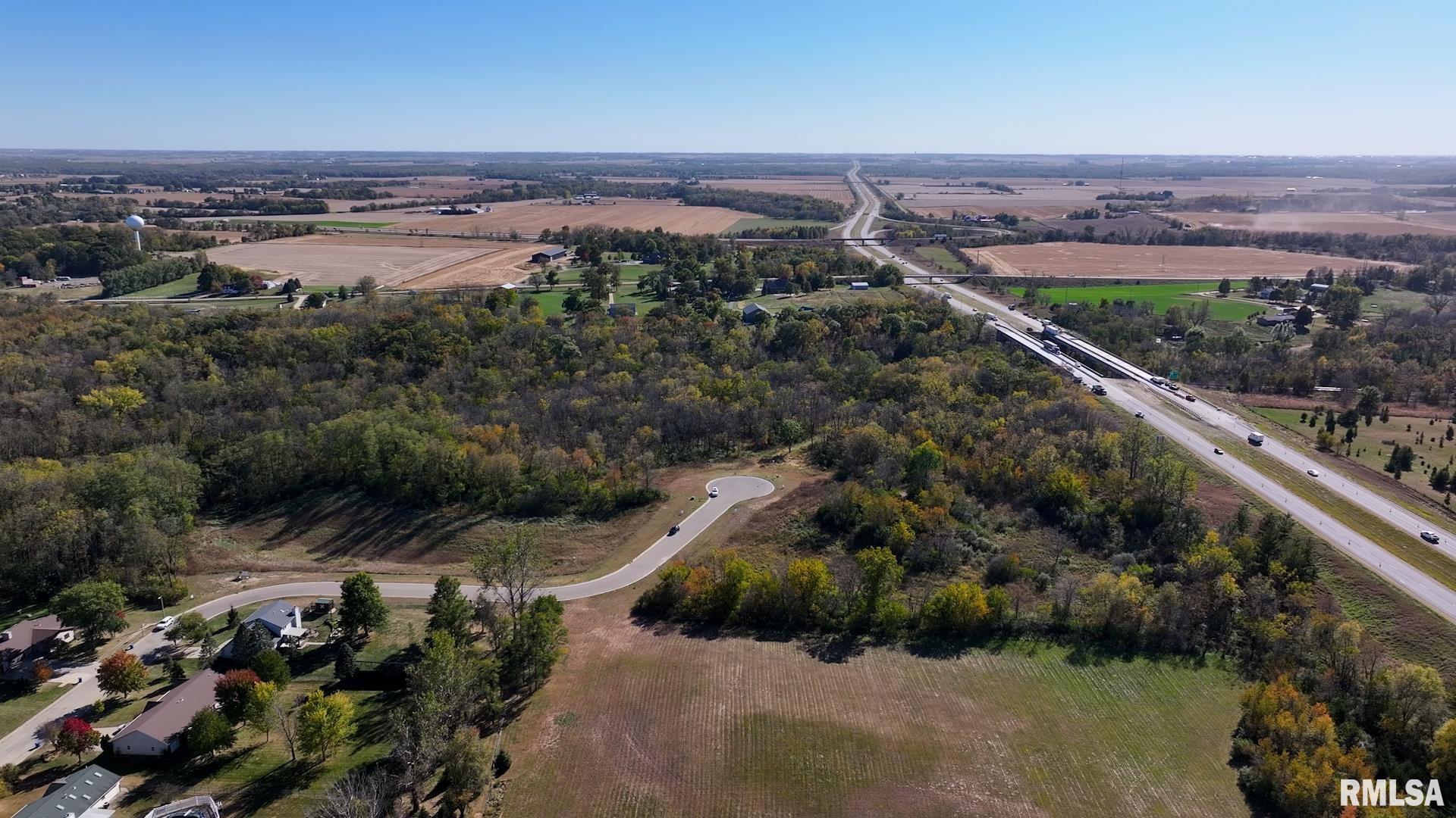 302 Silver Creek Road De Witt, IA 52742 - Photo 4 of 14 an aerial view of a city