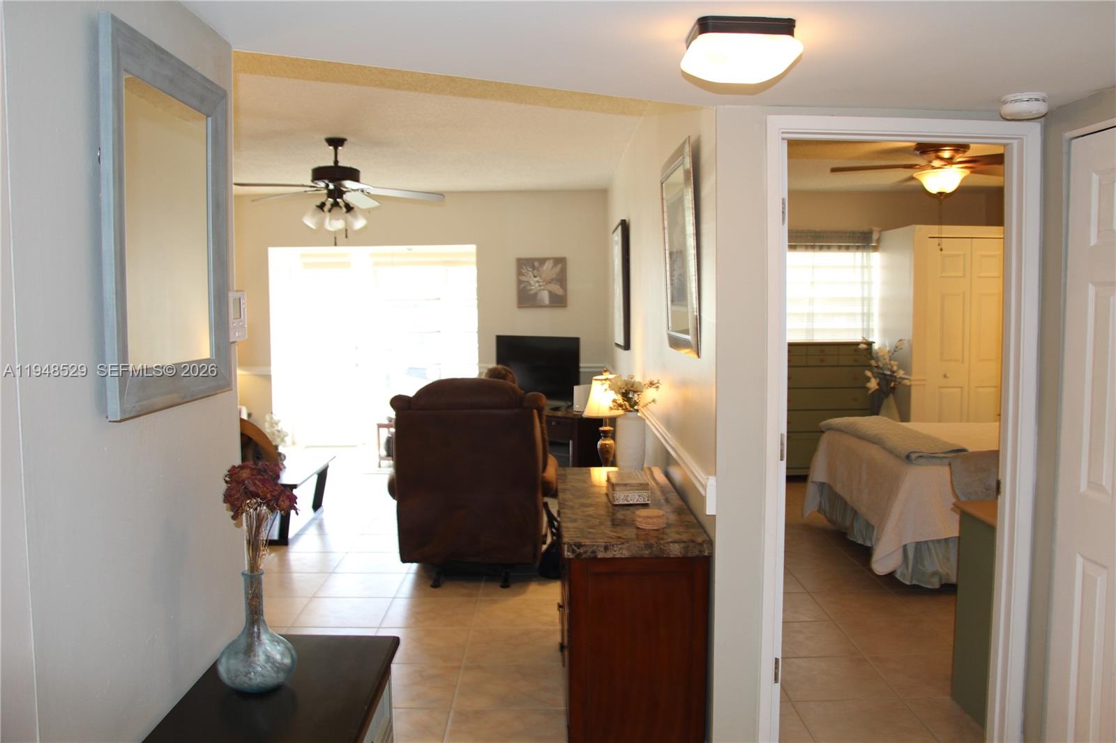 5620 Southwest 3rd Place, Unit 114 Margate, FL 33068 - Photo 20 of 29 a en suite bathroom with a sink and mirror