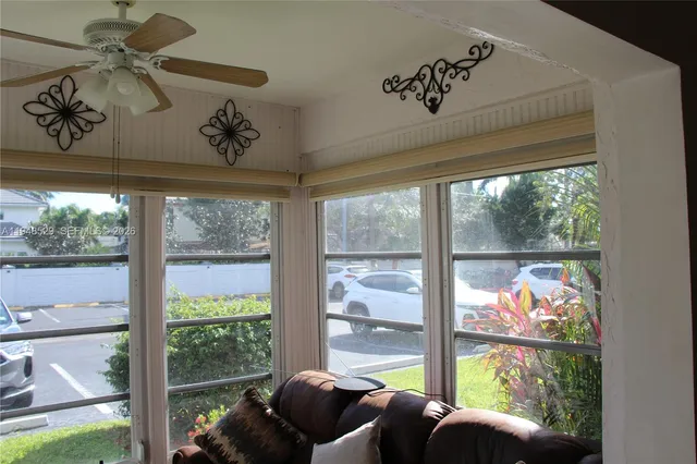 a living room with large windows