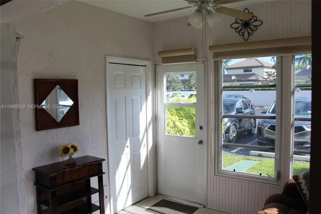 a room with furniture and a window