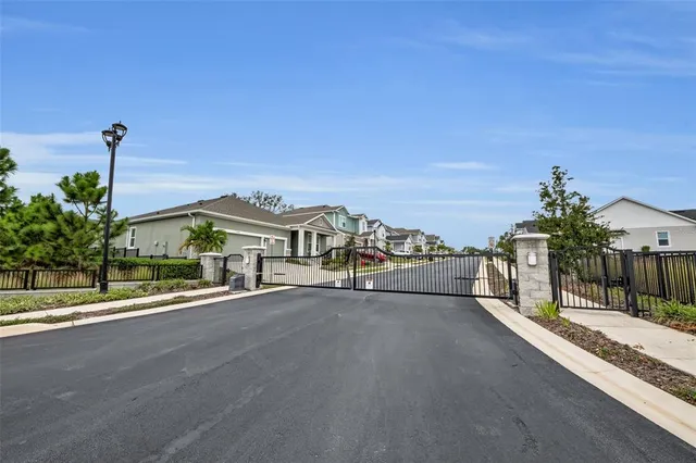 a view of a street with a building in the background