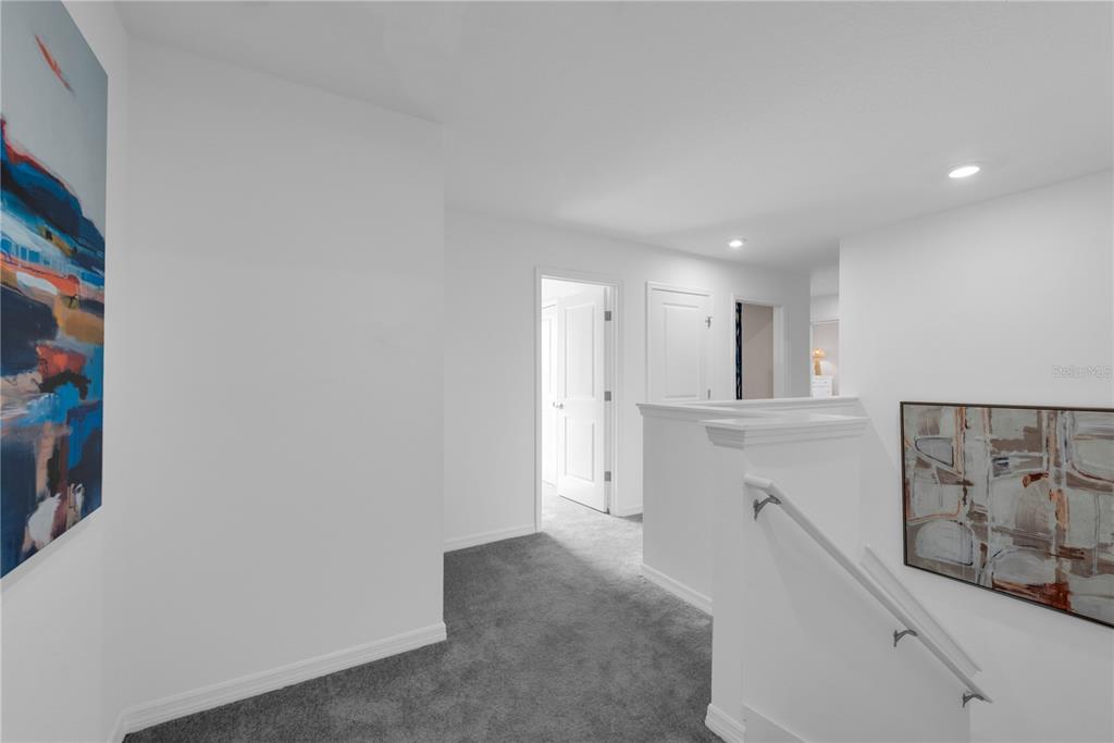 643 Rockaway Lane Cocoa, FL 32927 - Photo 15 of 34 a view of a hallway with workspace