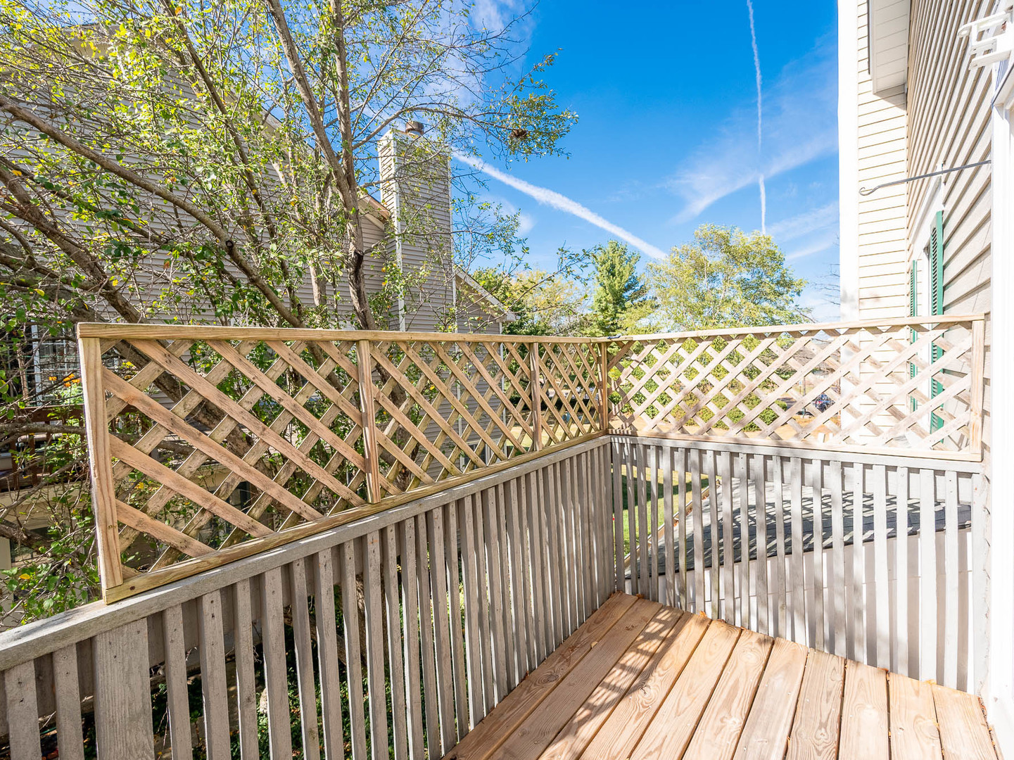 2214 Colorado Avenue, Unit 2214 Elgin, IL 60123 - Photo 14 of 14 a view of a balcony with wooden floor