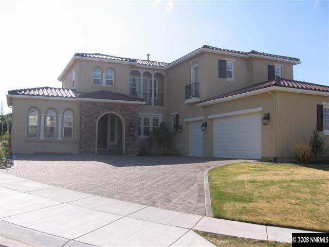 8564 Timaru Trail Reno, NV 89523 - Photo 1 of 8 a front view of a house with a yard and garage