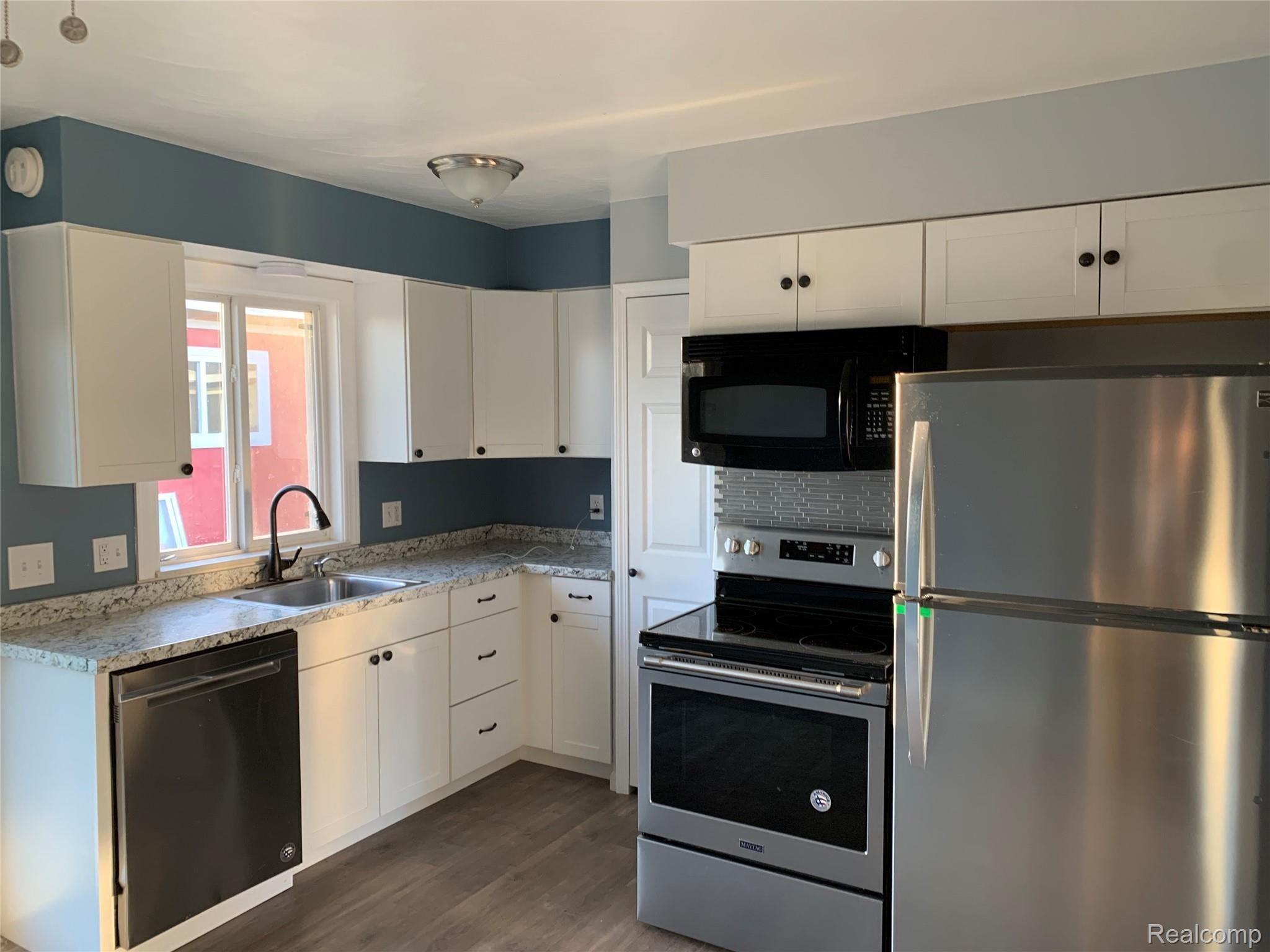 10497 Stelzer Road Howell, MI 48855 - Photo 8 of 31 10497 Stelzer Rd. updated kitchen with all new appliances