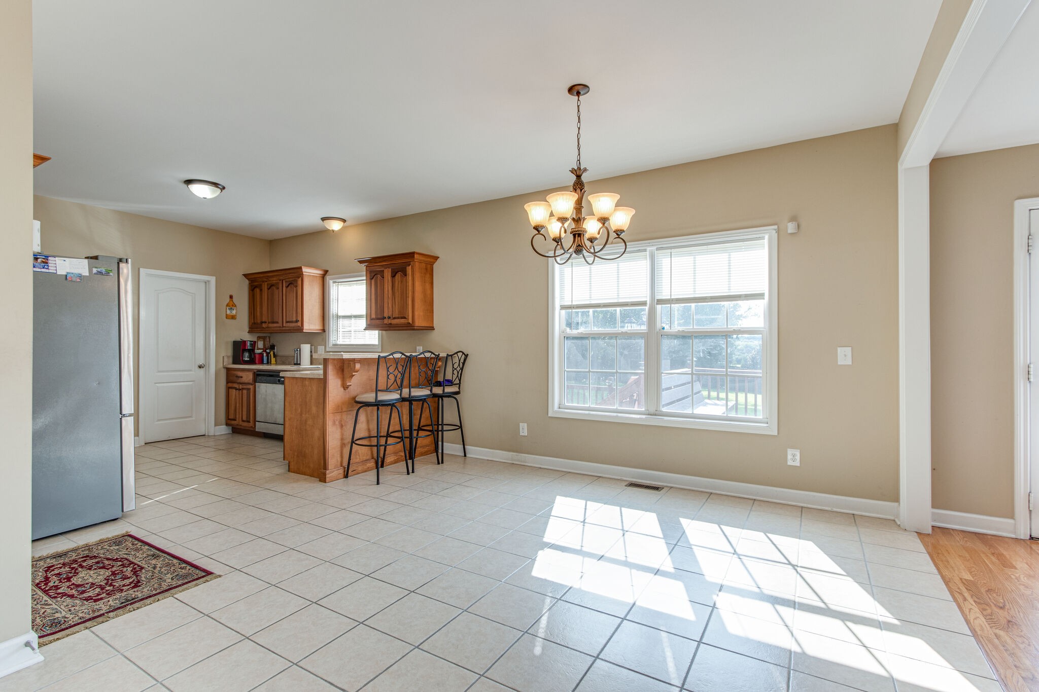 4877 Arnold Drive Murfreesboro, TN 37129 - Photo 15 of 32 a view of a kitchen with furniture and stainless steel appliances
