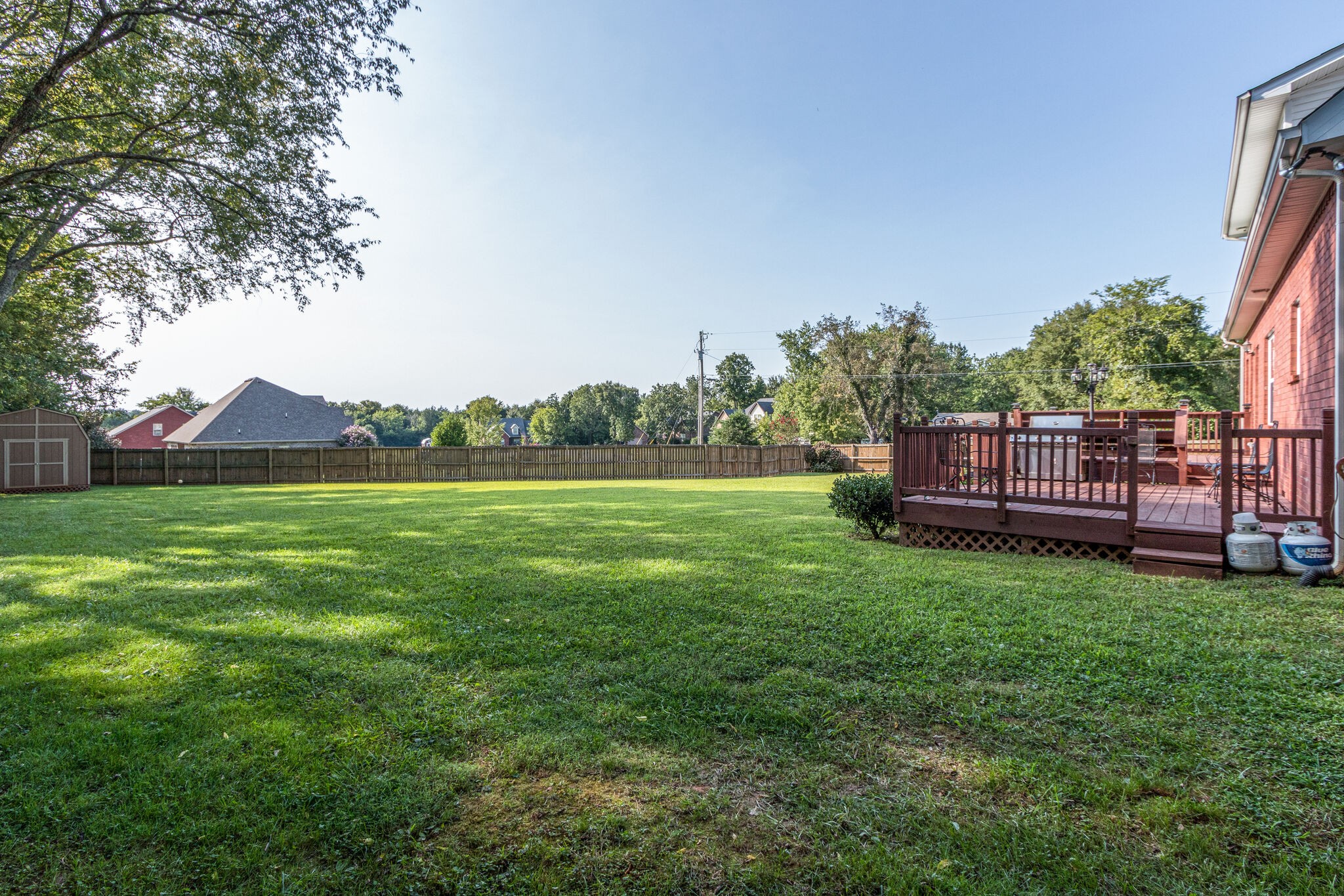 4877 Arnold Drive Murfreesboro, TN 37129 - Photo 30 of 32 a view of yard with house and trees in the background