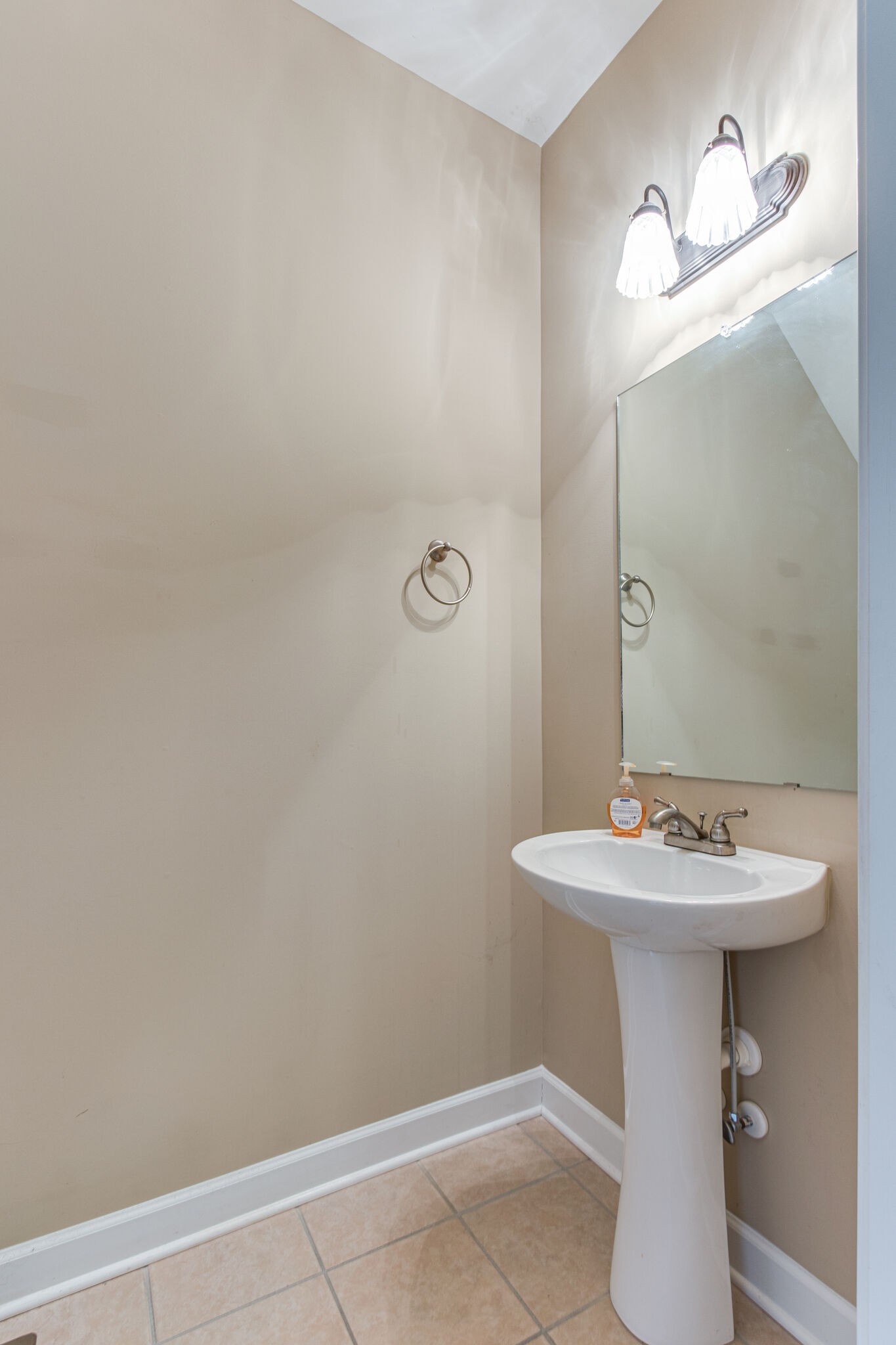 4877 Arnold Drive Murfreesboro, TN 37129 - Photo 10 of 32 a bathroom with a sink mirror and toilet