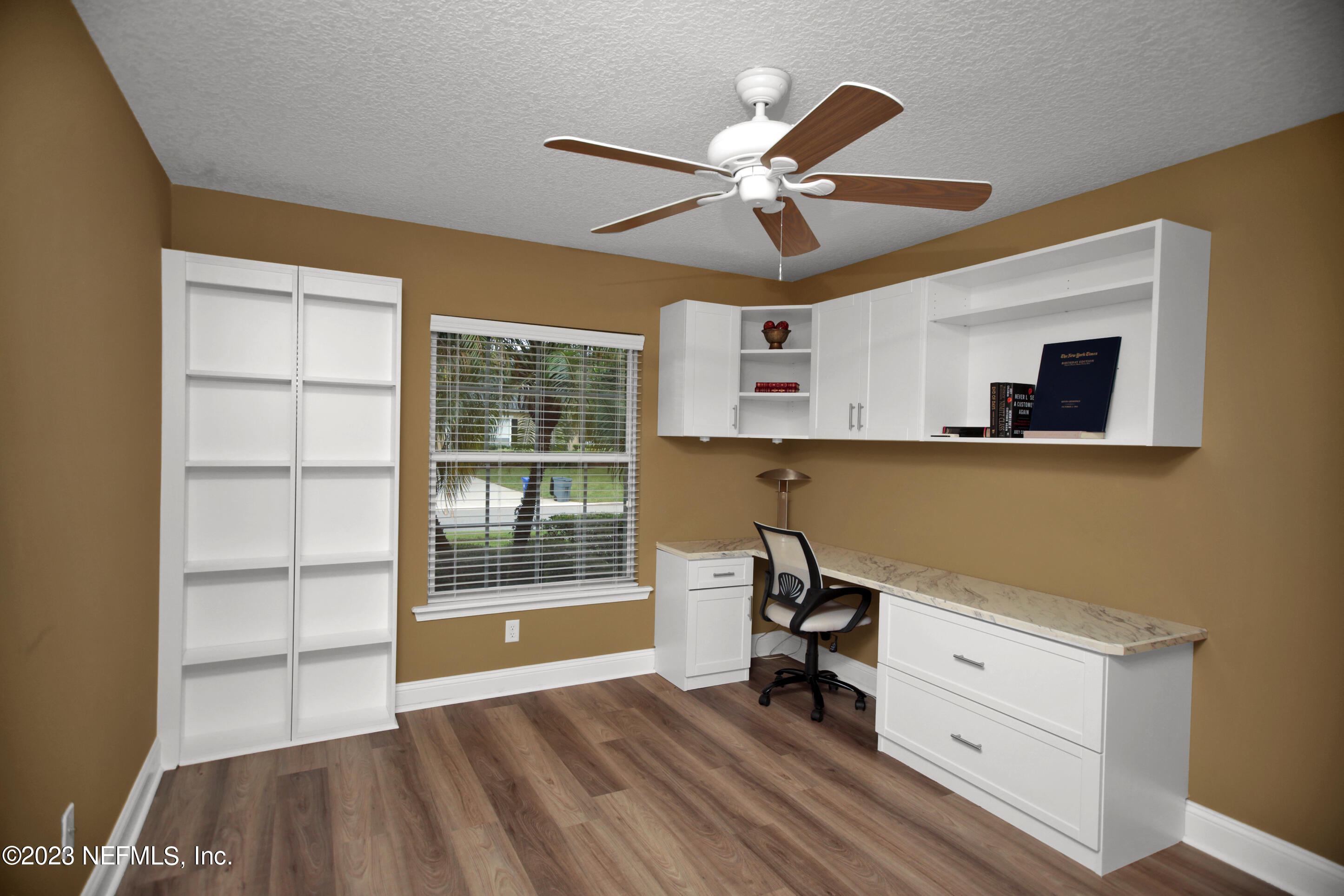 944 Oxford Drive St. Augustine, FL 32084 - Photo 33 of 58 a view of workspace with wooden floor and windows