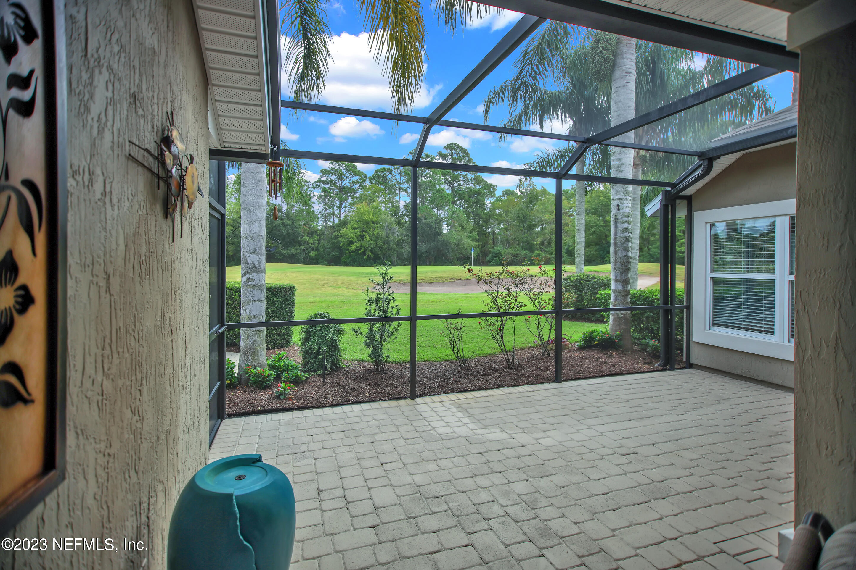 944 Oxford Drive St. Augustine, FL 32084 - Photo 40 of 58 REAR SCREENED LANAI - VIEW TO GOLF!
